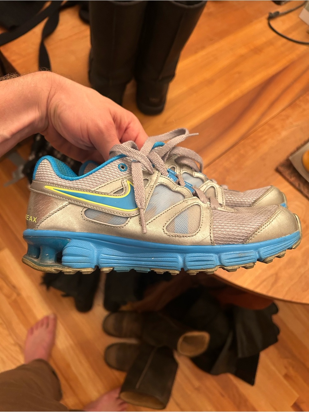 Nike Women’s Silver Sneakers with Blue and Yellow Accents